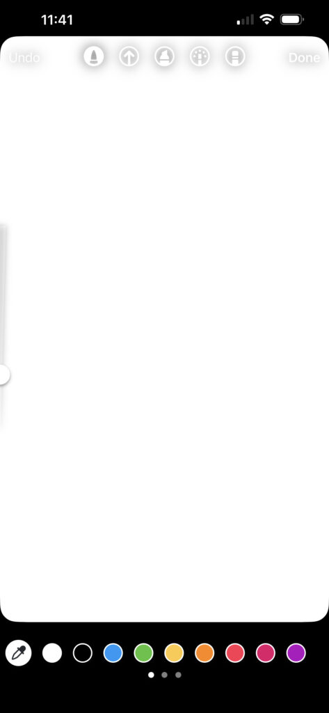 Instagram’s draw tool interface showing a blank white screen with color options and brush icons, illustrating the step where a user can add a background.